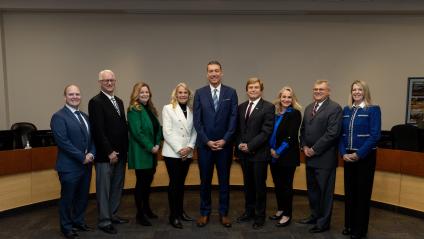 Mayor and members of Council standing in Council chambers