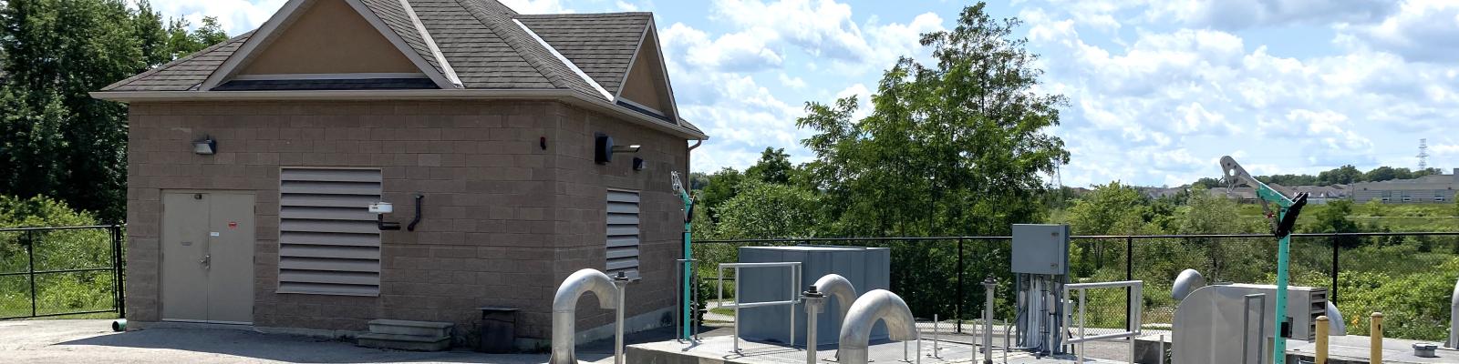 Wastewater Facility with a blue sky and clouds