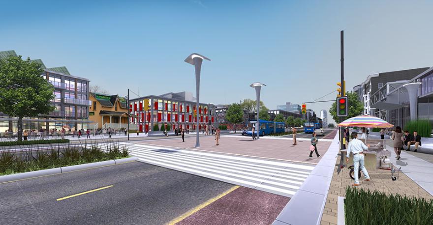 Modern city street with pedestrians, colorful buildings, and a crosswalk under a clear sky.